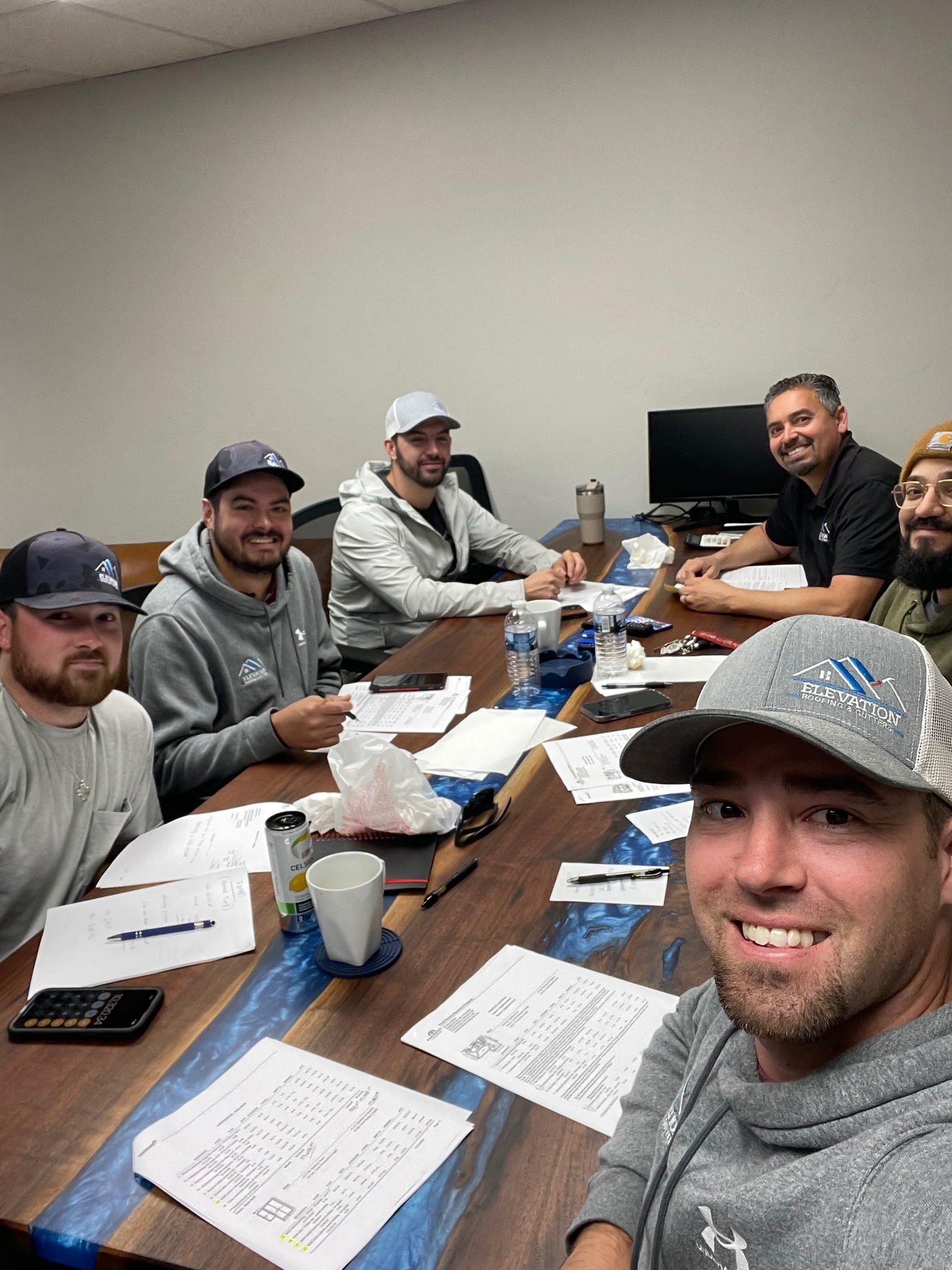 Team member working on roof installation project